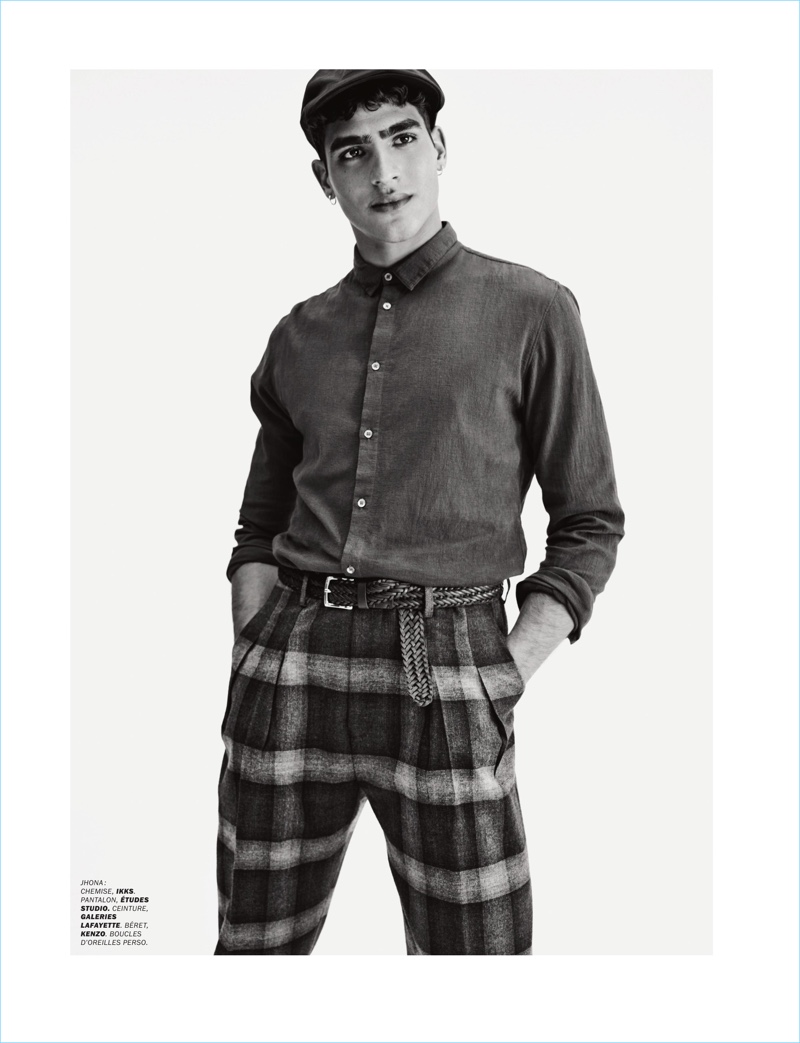 Jhonattan Burjack dons an IKKS shirt with Etudes Studio pants, a Galeries Lafayette belt, and Kenzo beret.