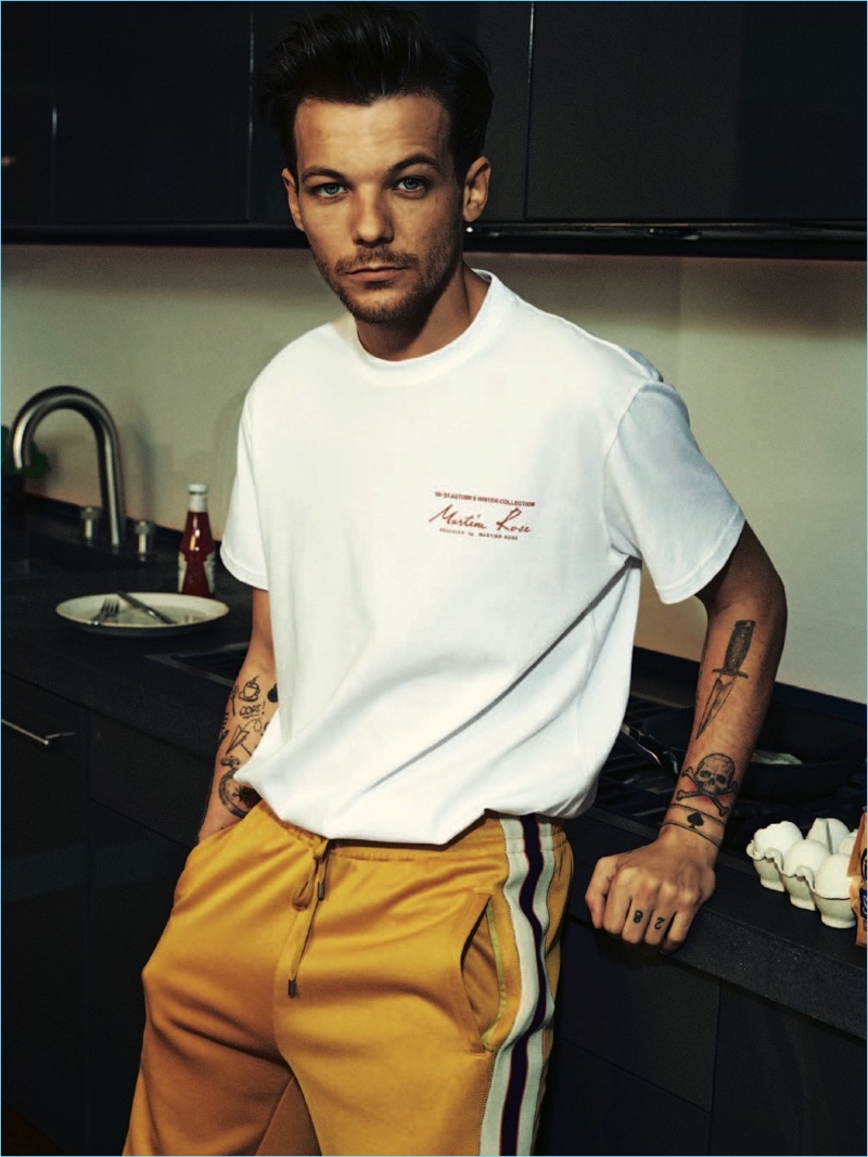 Singer Louis Tomlinson embraces sporty style for the pages of The Observer magazine.