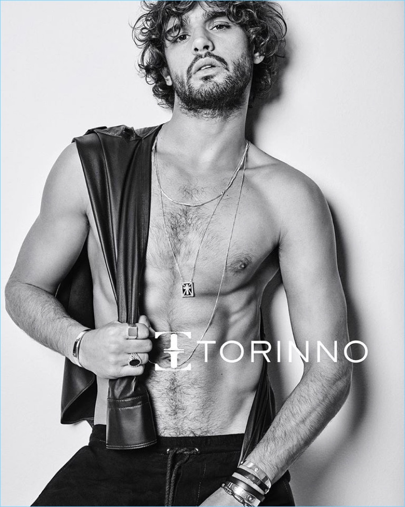Marlon Teixeira goes shirtless for Torinno's campaign.
