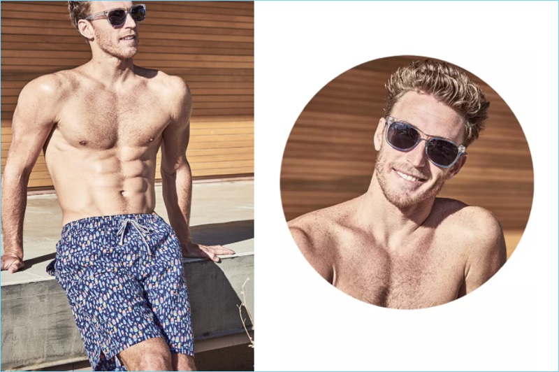 Relaxing poolside, Rodrigo Calazans sports Peter Millar blue print swim trunks $85.