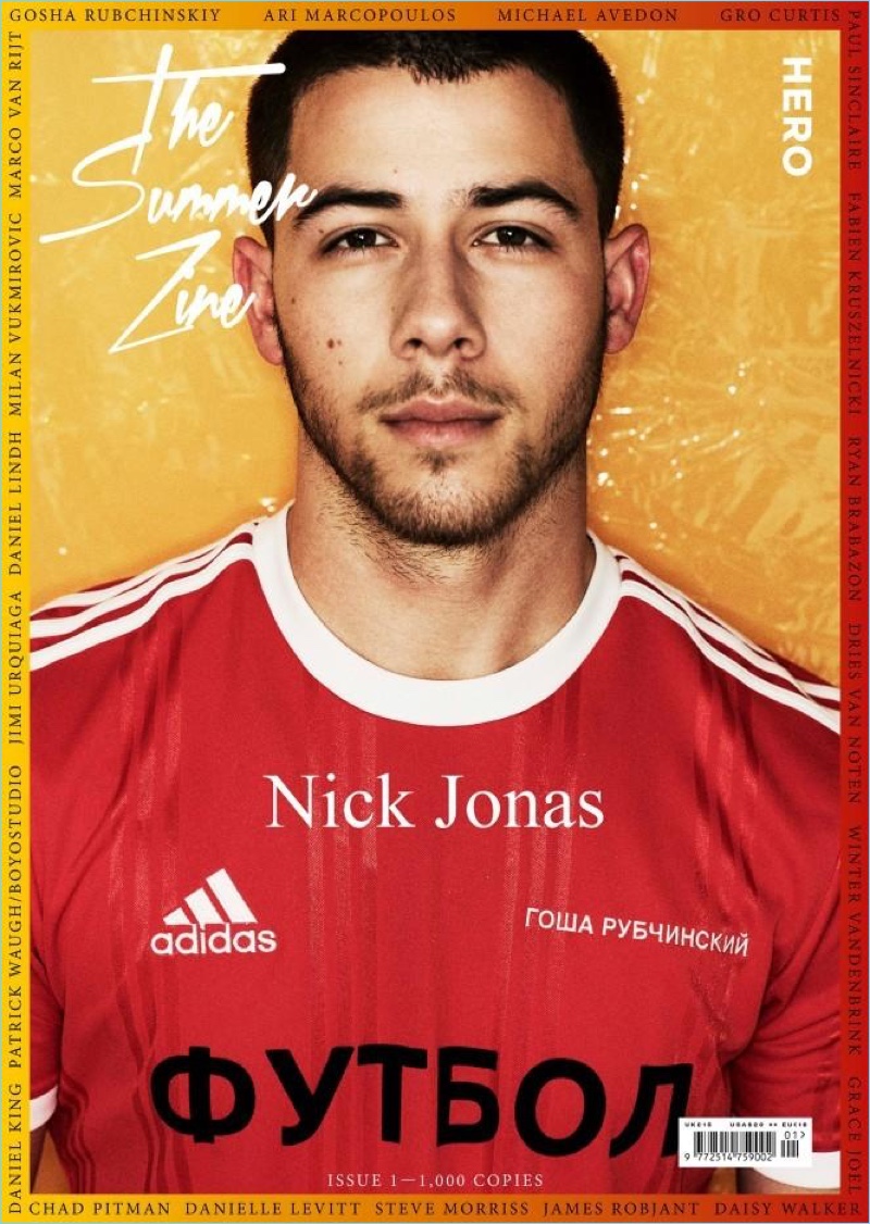 Nick Jonas covers the most recent issue of HERO magazine in an Adidas jersey.