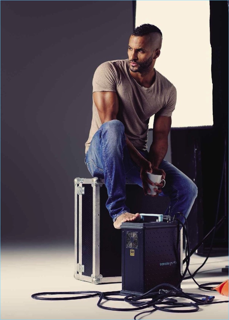 Starring in a photo shoot for Men's Fitness UK, Ricky Whittle wears a H&M t-shirt with Tiger of Sweden denim jeans.