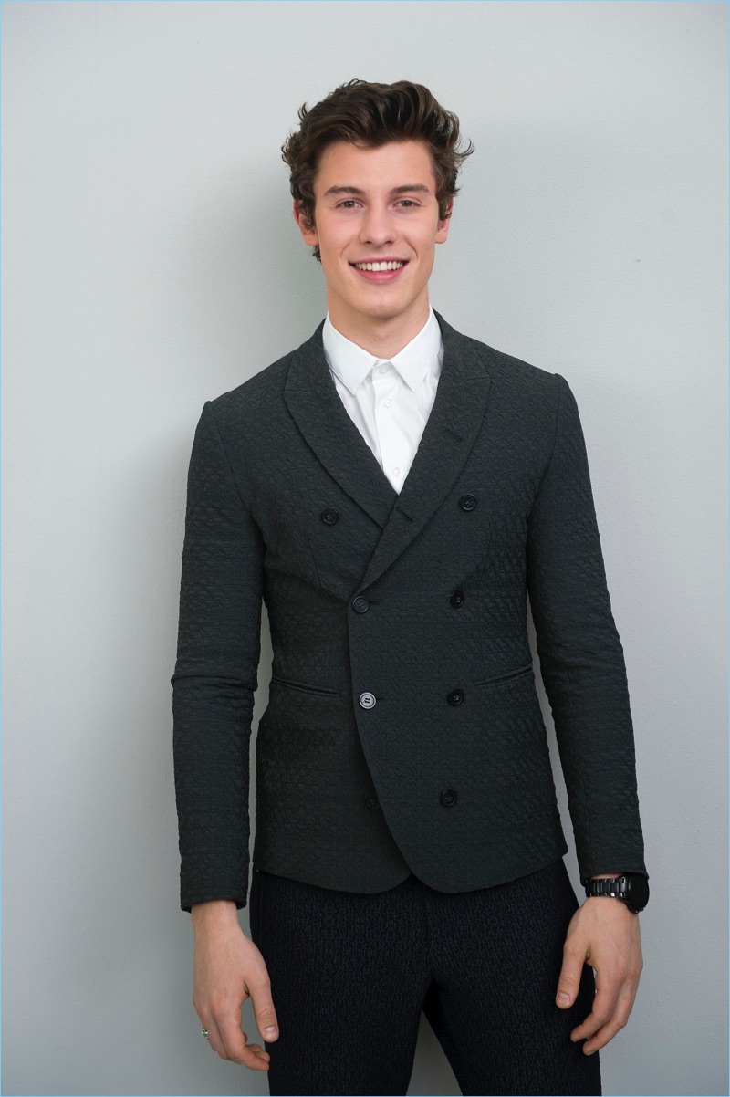 All smiles, Shawn Mendes wears Emporio Armani.