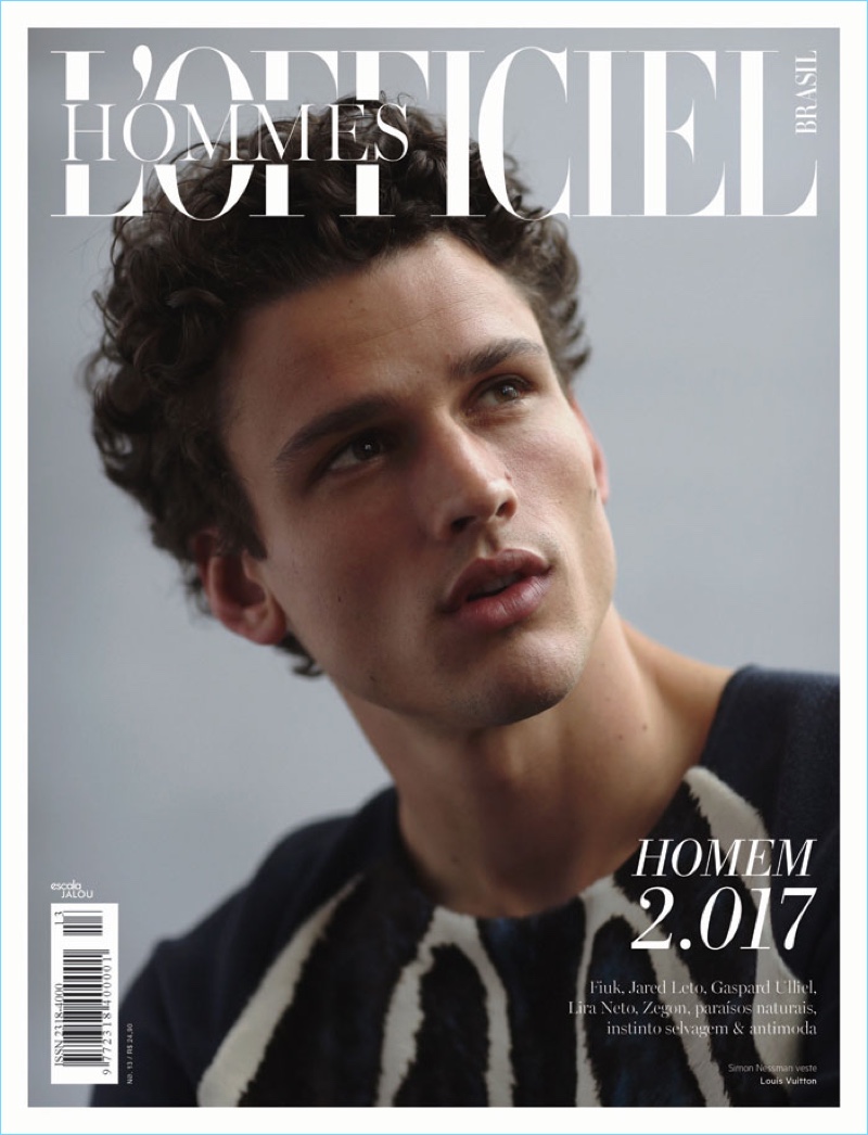 Simon Nessman covers L'Officiel Hommes Brasil in a sweater from French fashion house, Louis Vuitton.