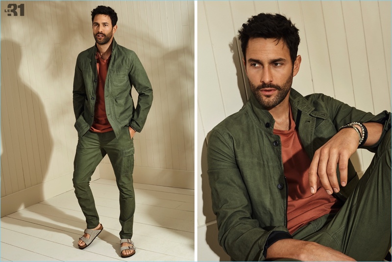 Reuniting with Simons, Noah Mills wears a LE 31 t-shirt, utility jacket, cargo pants, and Birkenstock sandals.