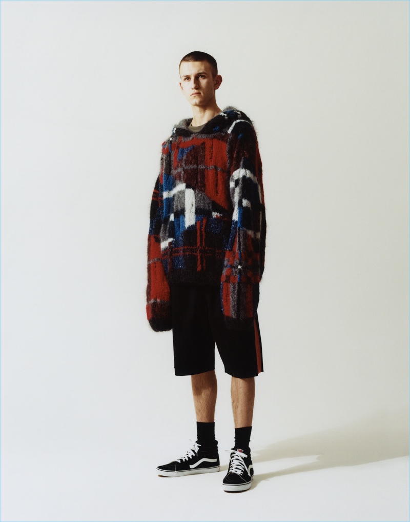 Lewis Murphy sports an oversized pullover and shorts from Topman's fall-winter 2017 collection.