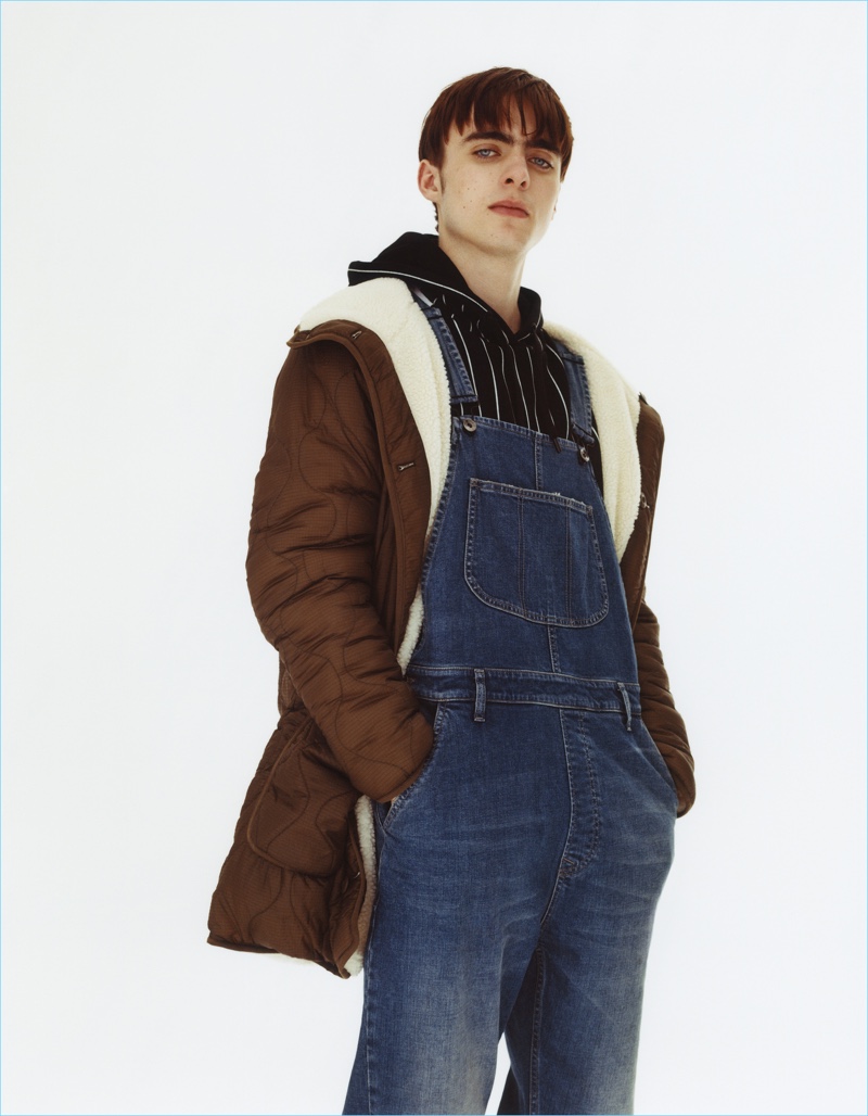 Lennon Gallagher rocks a pair of denim overalls from Topman's fall-winter 2017 collection.