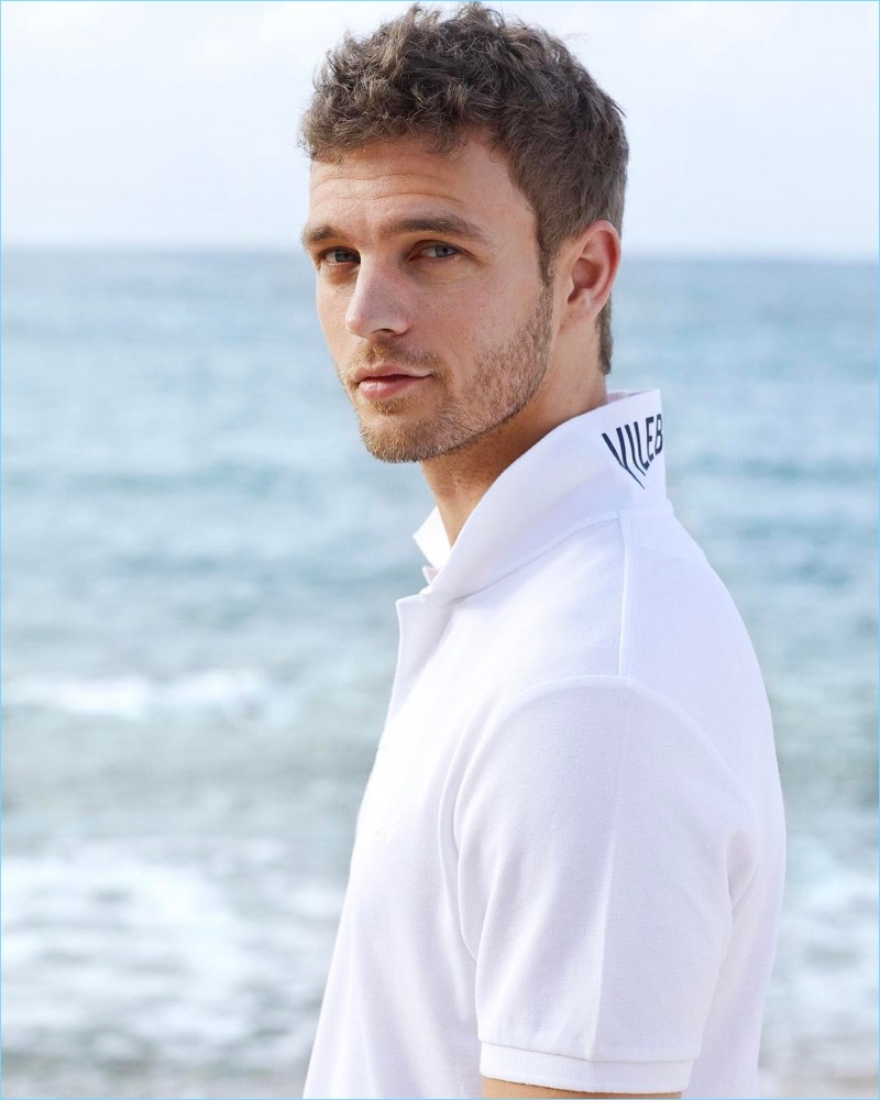 Swedish model Benjamin Eidem sports a white polo from Vilebrequin.