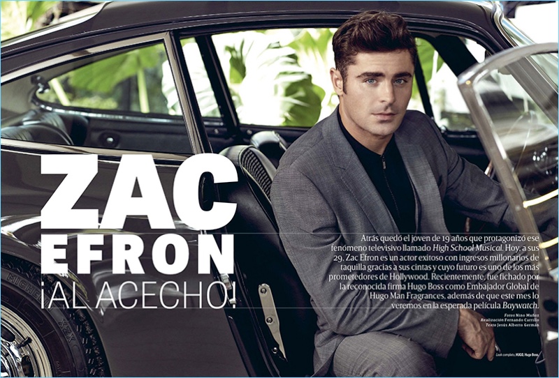 Posing in a car, Zac Efron wears a look by HUGO Hugo Boss.