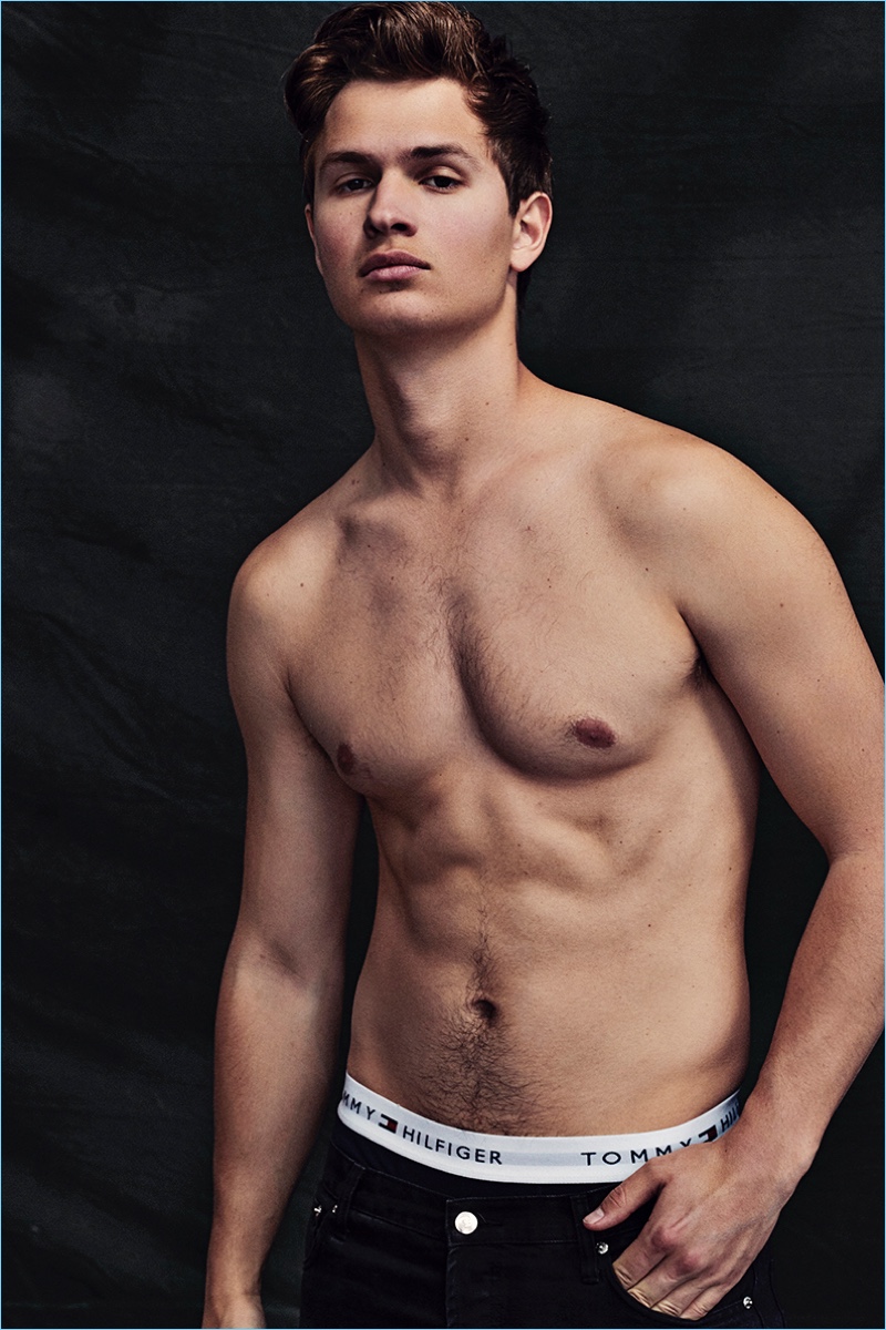 Going shirtless, Ansel Elgort wears Tommy Hilfiger underwear and Tommy Jeans denim.