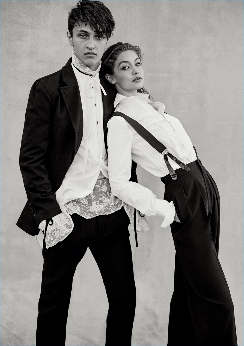 A model brother and sister pairing, Anwar and Gigi Hadid grace the pages of Vogue. Anwar wears a shirt, suit, and lace top by Ann Demeulemeester.