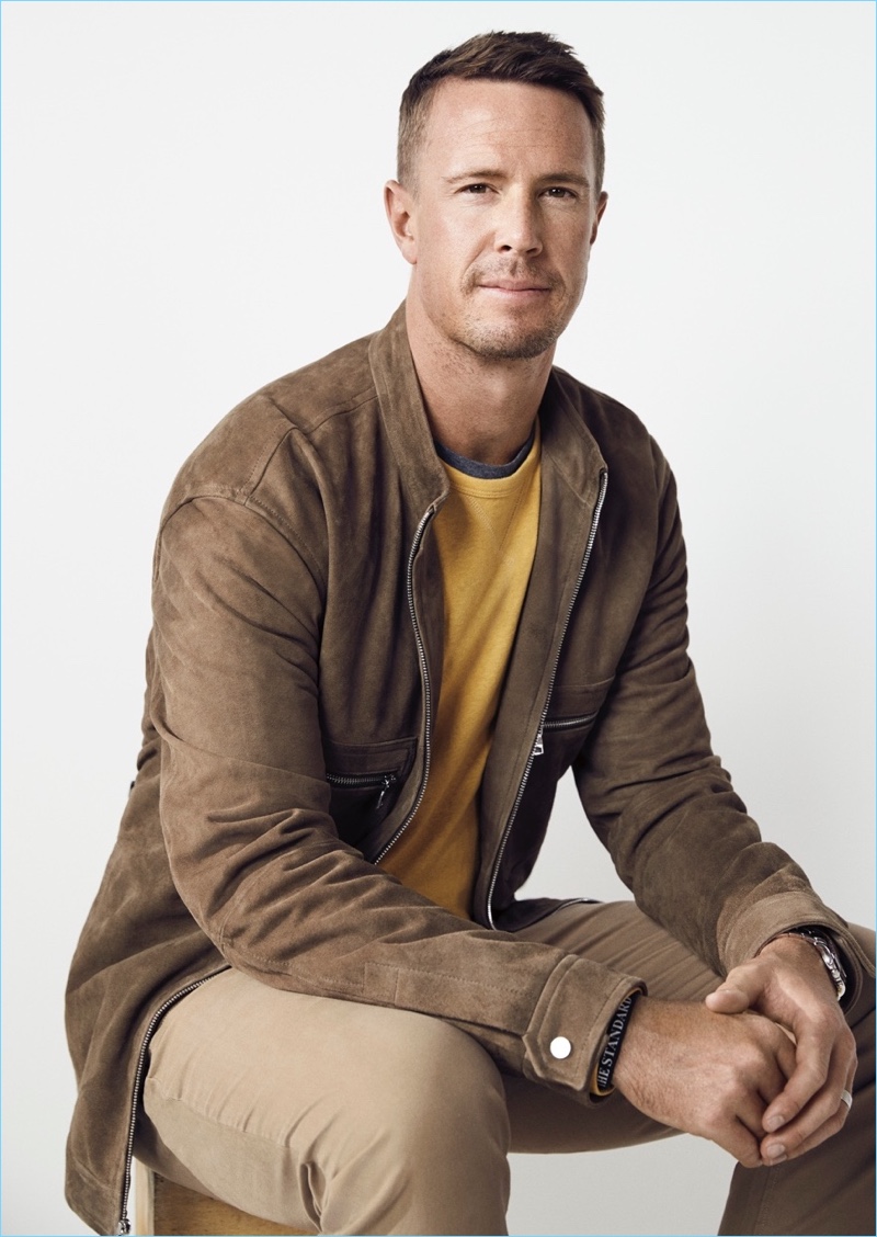 Sitting for a portrait, Matt Ryan wears Banana Republic's Rapid Movement chinos.