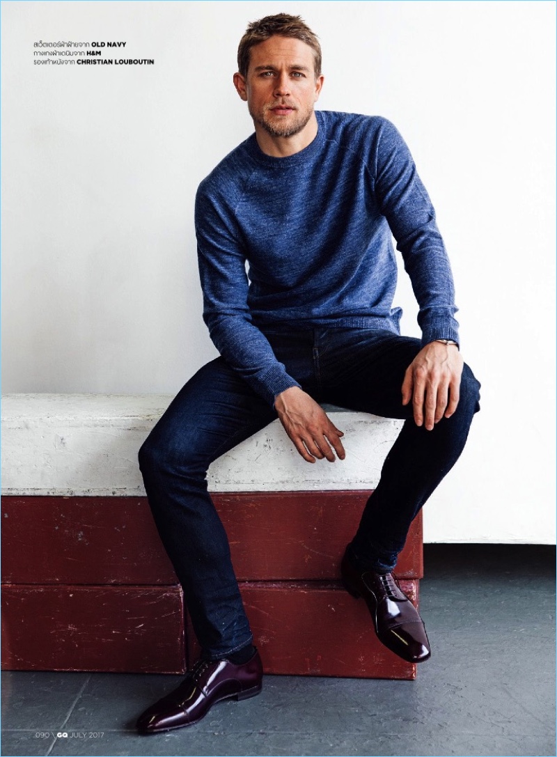 Gracing the pages of GQ Thailand, Charlie Hunnam wears casual staples from Old Navy and H&M.