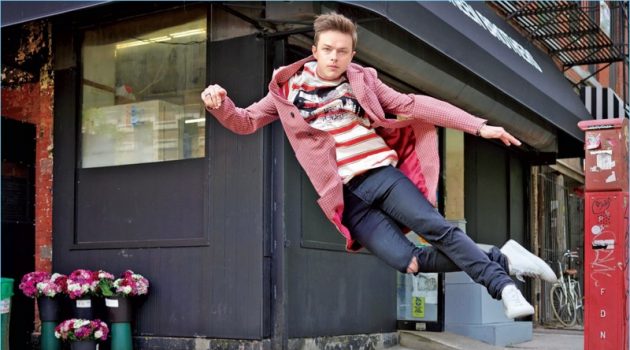Dane DeHaan Covers American Way, Talks Joy of Filming 'Valerian' Leaping, Dane DeHaan wears a Stella McCartney t-shirt with a Prada overcoat. He also sports Saint Laurent jeans and Common Projects sneakers.