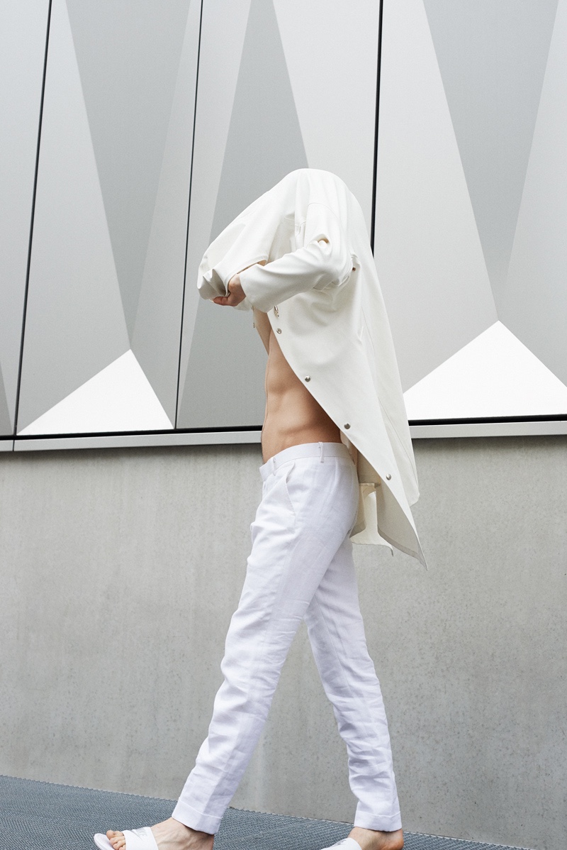 Leon wears coat Stutterheim and pants Atelier NA.