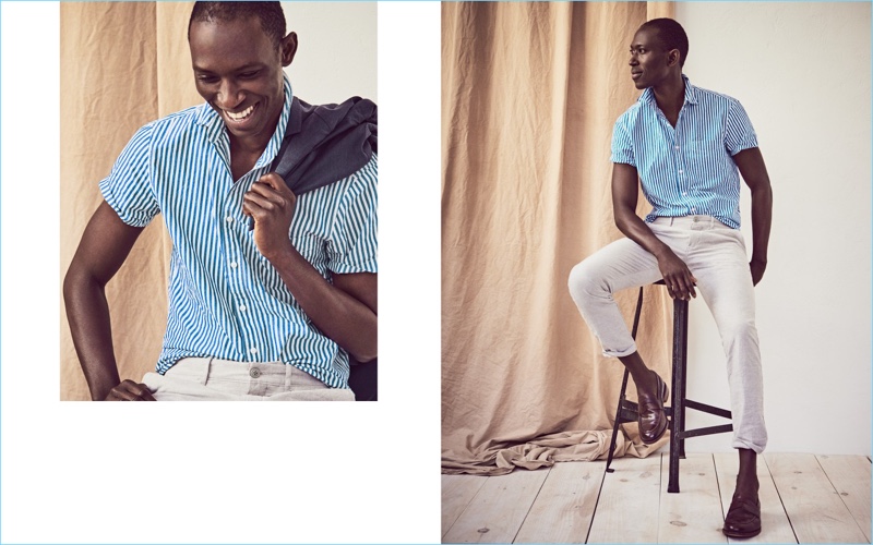 Bengal-Striped Shirt: All smiles, Armando Cabral wears a J.Crew short-sleeve shirt $54.50 with blue stripes.