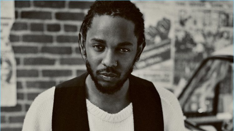 Front and center, Kendrick Lamar wears an Ann Demeulemeester vest with a Raf Simons sweater and Simon Miller jeans.