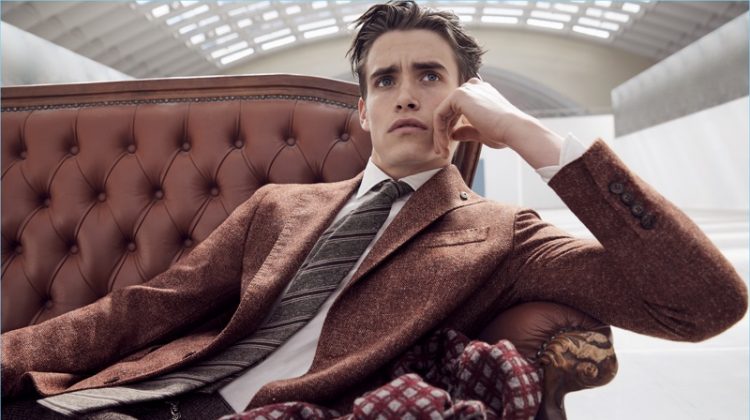 Relaxing, Sascha Wolf dons sleek tailored suiting essentials from L.B.M. 1911.