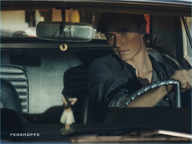 Lucky Blue Smith gets behind the wheels of a vintage car for Penshoppe's DenimLab campaign.