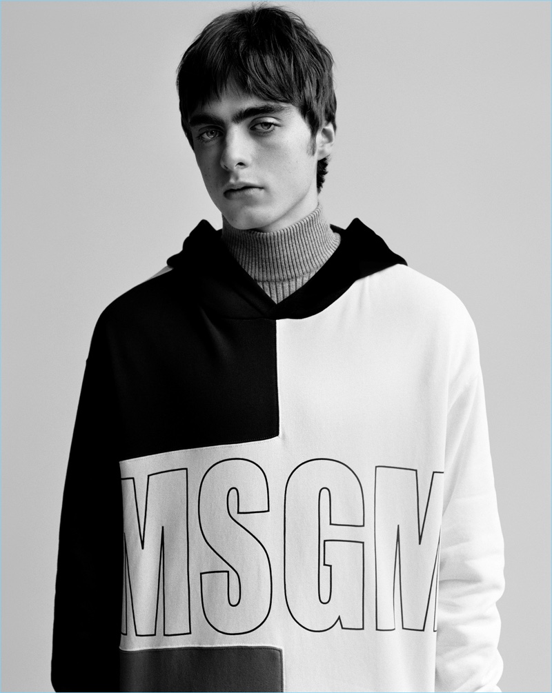 Lennon Gallagher rocks a black and white hoodie for MSGM's fall-winter 2017 campaign.