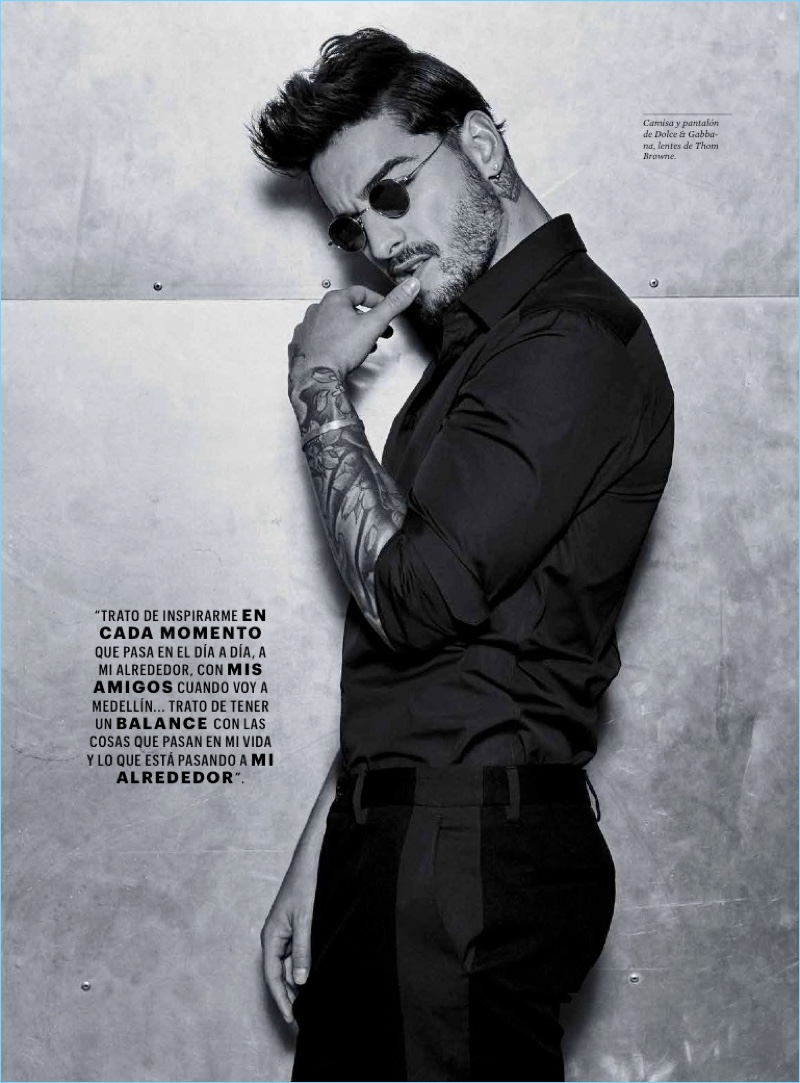 A cool vision, Maluma wears a Dolce & Gabbana shirt and trousers with Thom Browne sunglasses.
