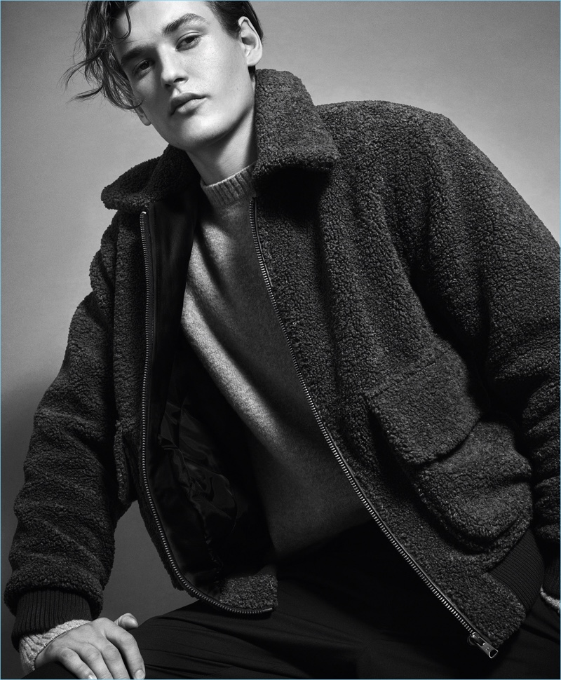 Appearing in a black and white image, Jegor Venned stars in Mango Man's fall-winter 2017 campaign.