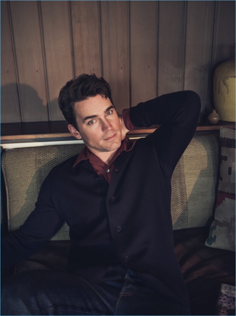 Connecting with Mr Porter, Matt Bomer wears a P. Johnson cardigan, Camoshita shirt, and A.P.C. Petit New Standard slim-fit selvedge denim jeans.