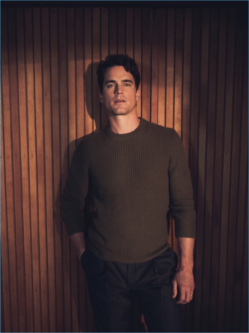 Actor Matt Bomer keeps his style simple in a Joseph sweater and Acne Studios trousers.