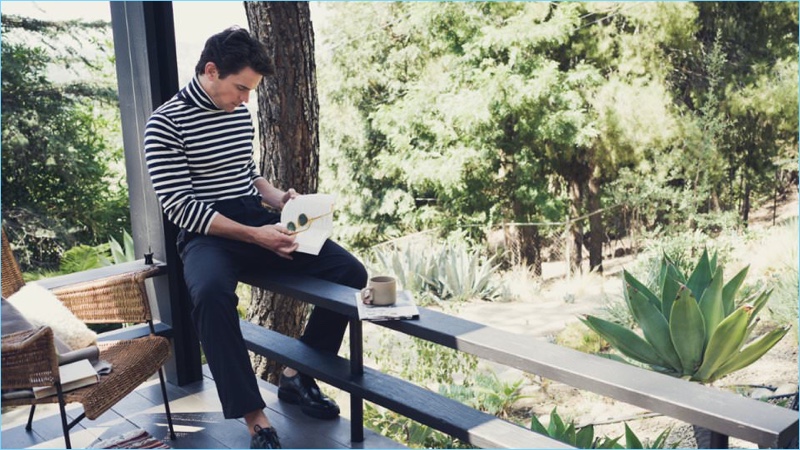 Embracing stripes, Matt Bomer wears a Connolly cashmere turtleneck sweater with Brunello Cucinelli trousers. He also sports Maison Margiela leather derby shoes.