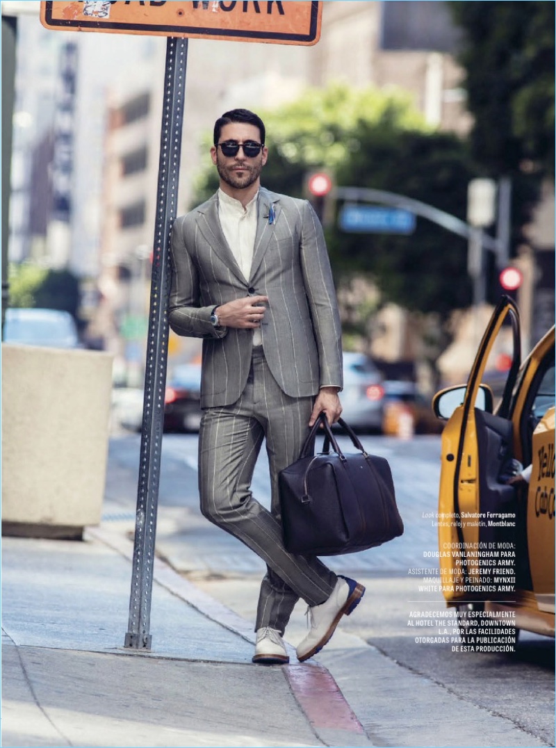 A sharp vision, Miguel Ángel Silvestre dons a Salvatore Ferragamo striped suit.