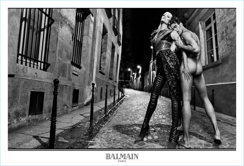 Jon Kortajarena goes nude for an image with Natasha Poly from Balmain's fall-winter 2017 campaign.