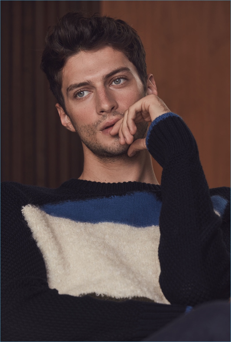 Sporting a graphic sweater, Matthew Bell connects with Reiss for a fall-winter 2017 style update.
