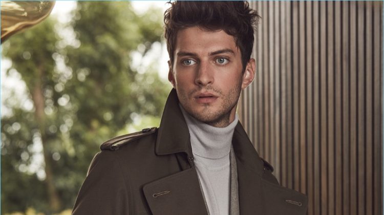 Matthew Bell dons a sleek trench coat from Reiss' fall-winter 2017 collection.