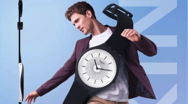 An advertising image featuring the Swatch SKIN watch.