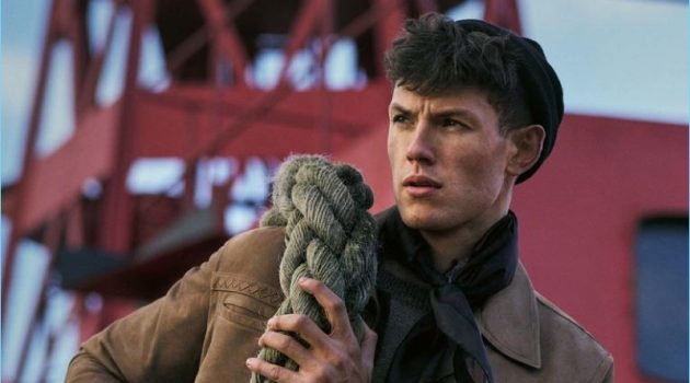 Ship to Shore: Tom Craig Rocks Nautical Style for Harrods Magazine BOTTEGA VENETA jacket £2,870; CERRUTI 1881 sweater from a selection; GIVENCHY trousers £705; ALEXANDER McQUEEN hat from a selection; ERMENEGILDO ZEGNA scarf £140; MIANSAI bracelet £89.95
