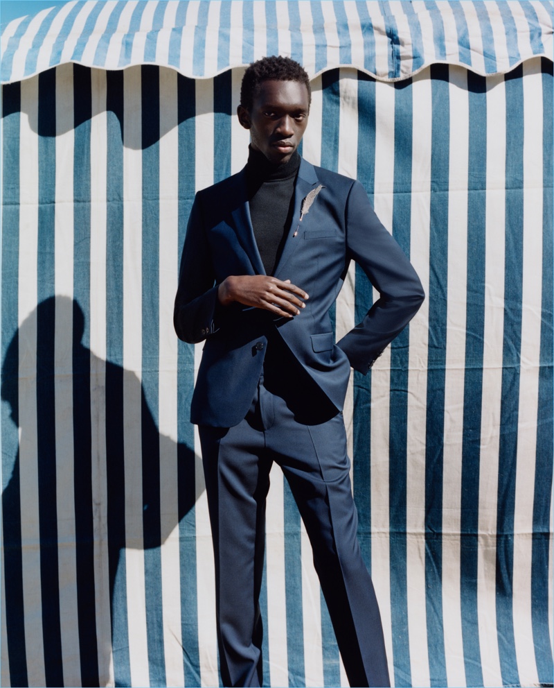 Wilson Oryema dons a sharp suit for HUGO's fall-winter 2017 campaign.