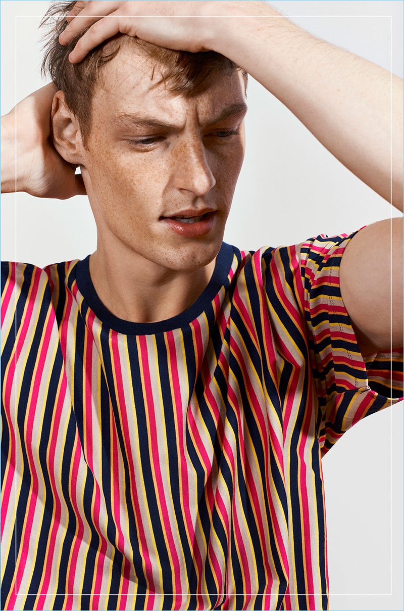 Front and center, Roberto Sipos models a striped t-shirt from Zara Man's Studio collection.