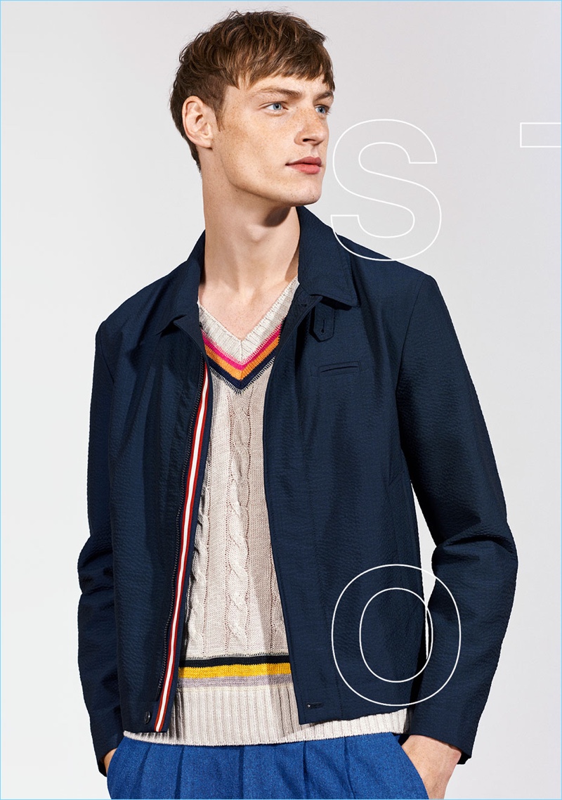 A smart vision, Roberto Sipos sports a jacket, sweater vest, and pleated trousers from Zara Man's Studio collection.