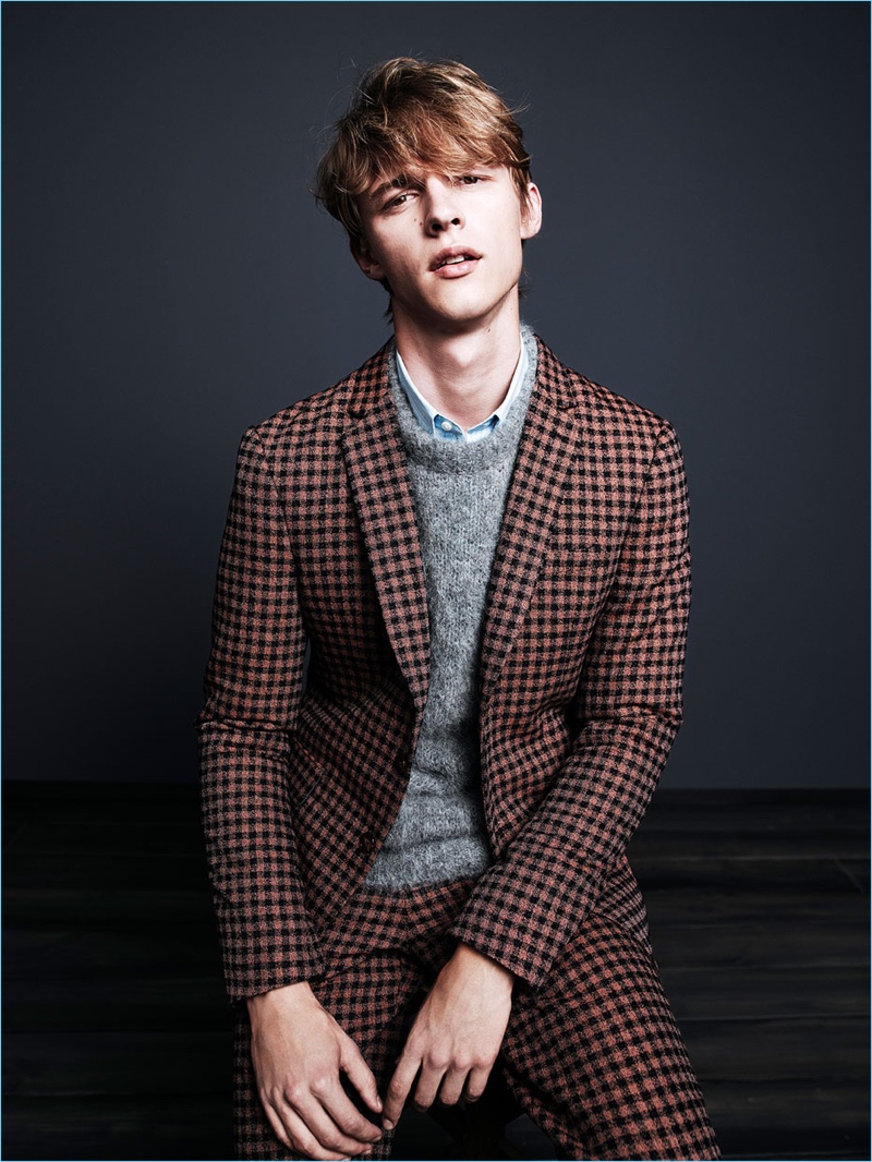 Max Barczak dons a check suit for Zara Man's fall-winter 2017 campaign.