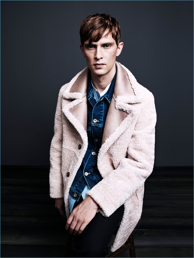 Mathias Lauridsen models a shearling style coat for Zara Man's fall-winter 2017 campaign.