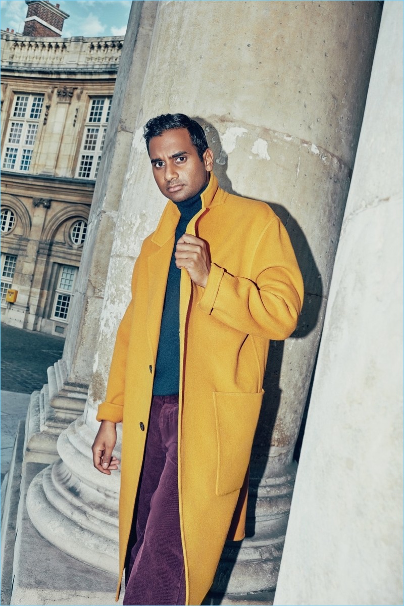 Embracing a pop of color, Aziz Ansari wears an AMI coat with a Corneliani turtleneck and Valentino pants.