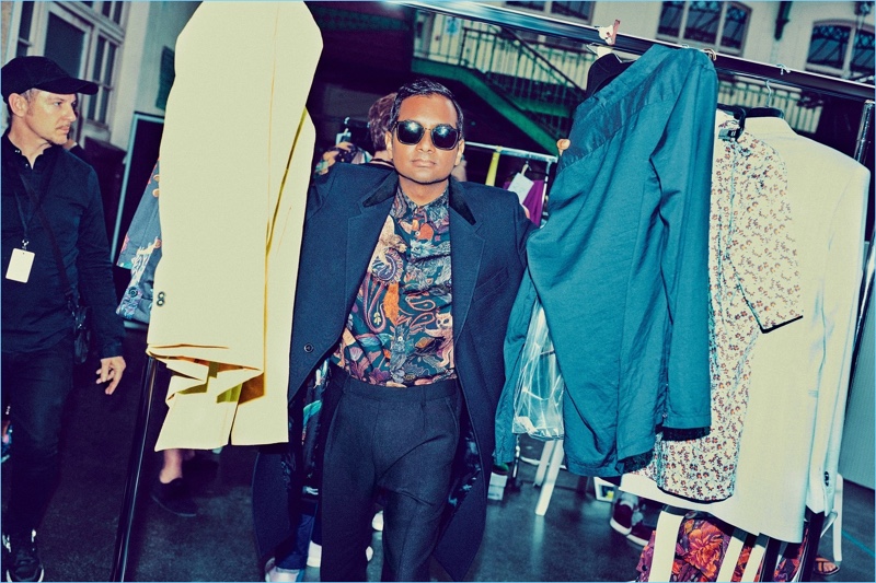 Attending Paul Smith's fashion show during Paris Fashion week, Aziz Ansari sports a look from the designer.