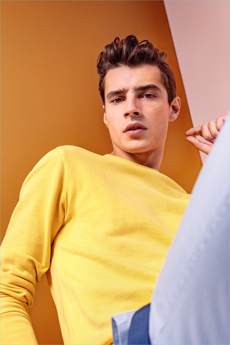 Embracing a pop of yellow, Adrien Sahores stars in Bensimon's spring-summer 2018 campaign.