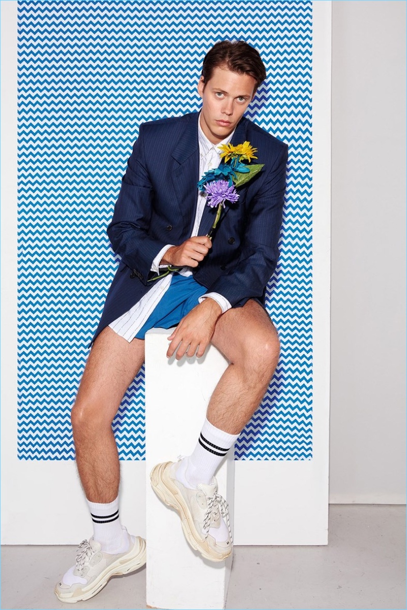 Actor Bill Skarsgård dons a Balenciaga look with vintage shorts for Dazed.