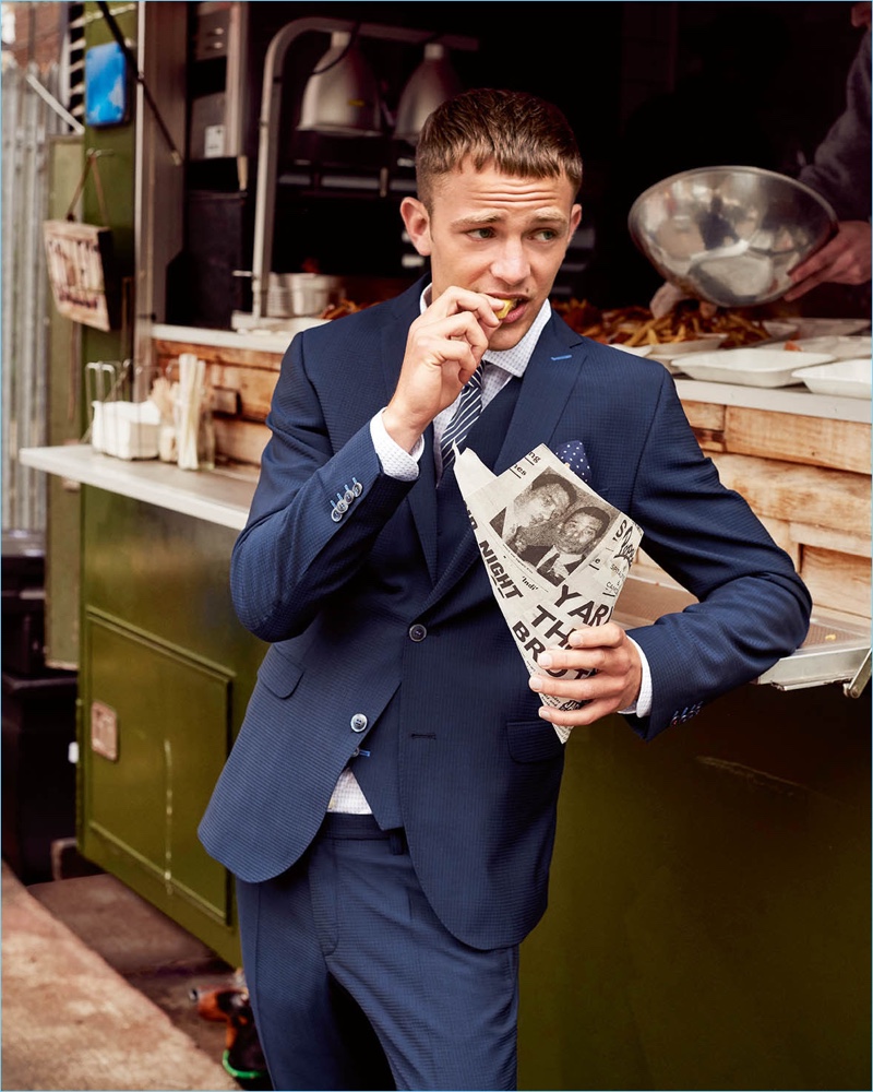 Guillaume Babouin enjoys a snack as the star of Club of Gents' spring-summer 2018 campaign.