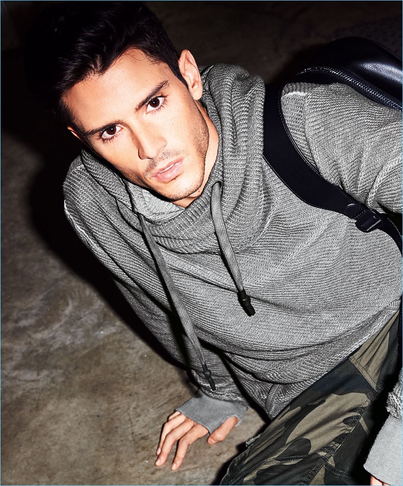 Going casual, Diego Barrueco wears a Tigha pullover with Jack & Jones pants.