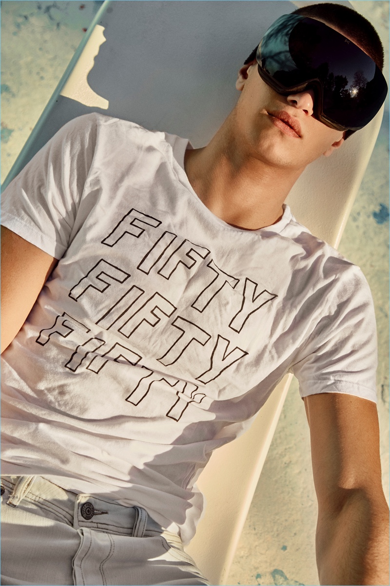 Relaxing, Gianluca Alessi stars in Fifty Five's spring-summer 2018 campaign.