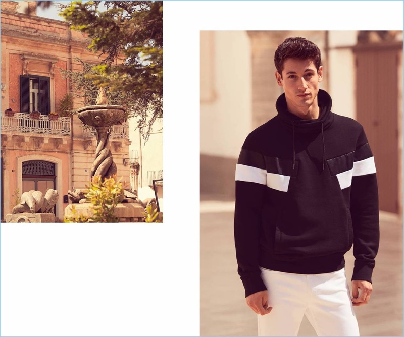 Making a case for black and white, Nicolas Ripoll wears a H&M sweatshirt $34.99 and skinny fit twill pants $29.99.