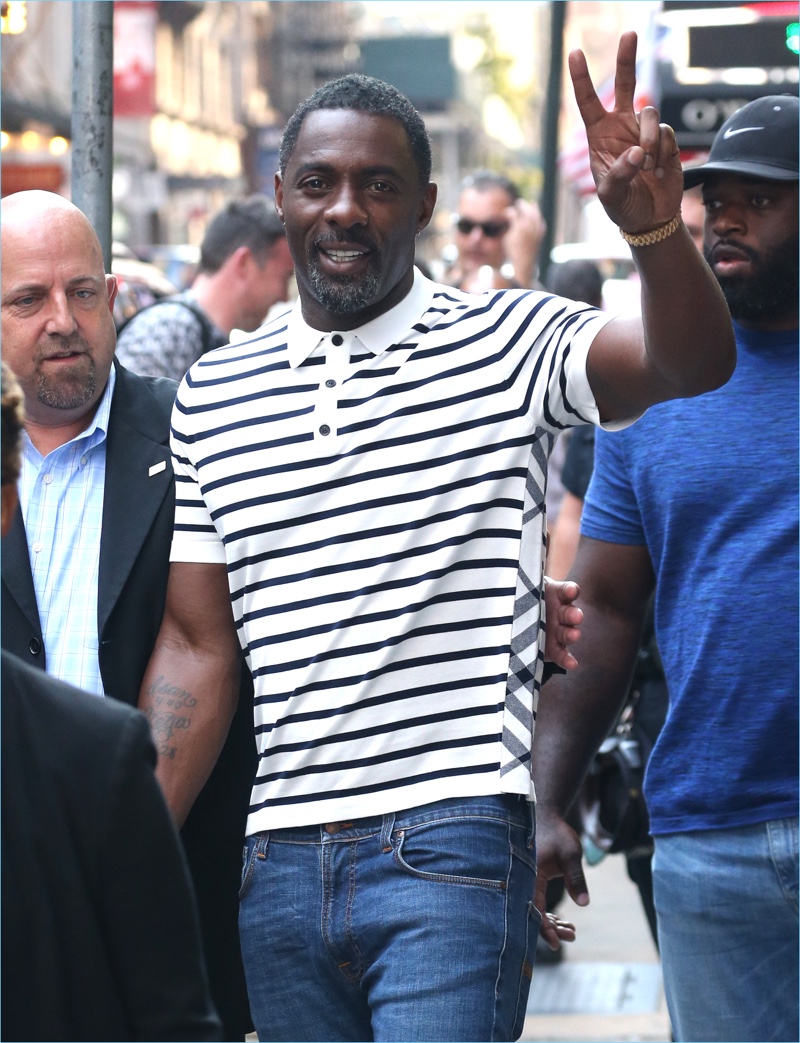 Idris Elba dons a striped Burberry polo as he attends a taping of Good Morning America in New York City.