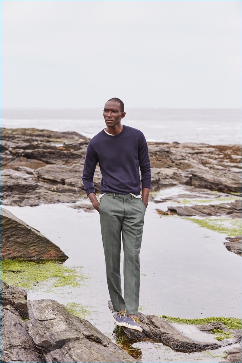 J.Crew makes a case for its Four-Season wool Bowery slim pants $98. Here, Armando Cabral wears the style in field green. He also sports a J.Crew Italian merino wool sweater $79.50, broken-in t-shirt $24.50, and Vans for J.Crew canvas authentic sneakers $60.